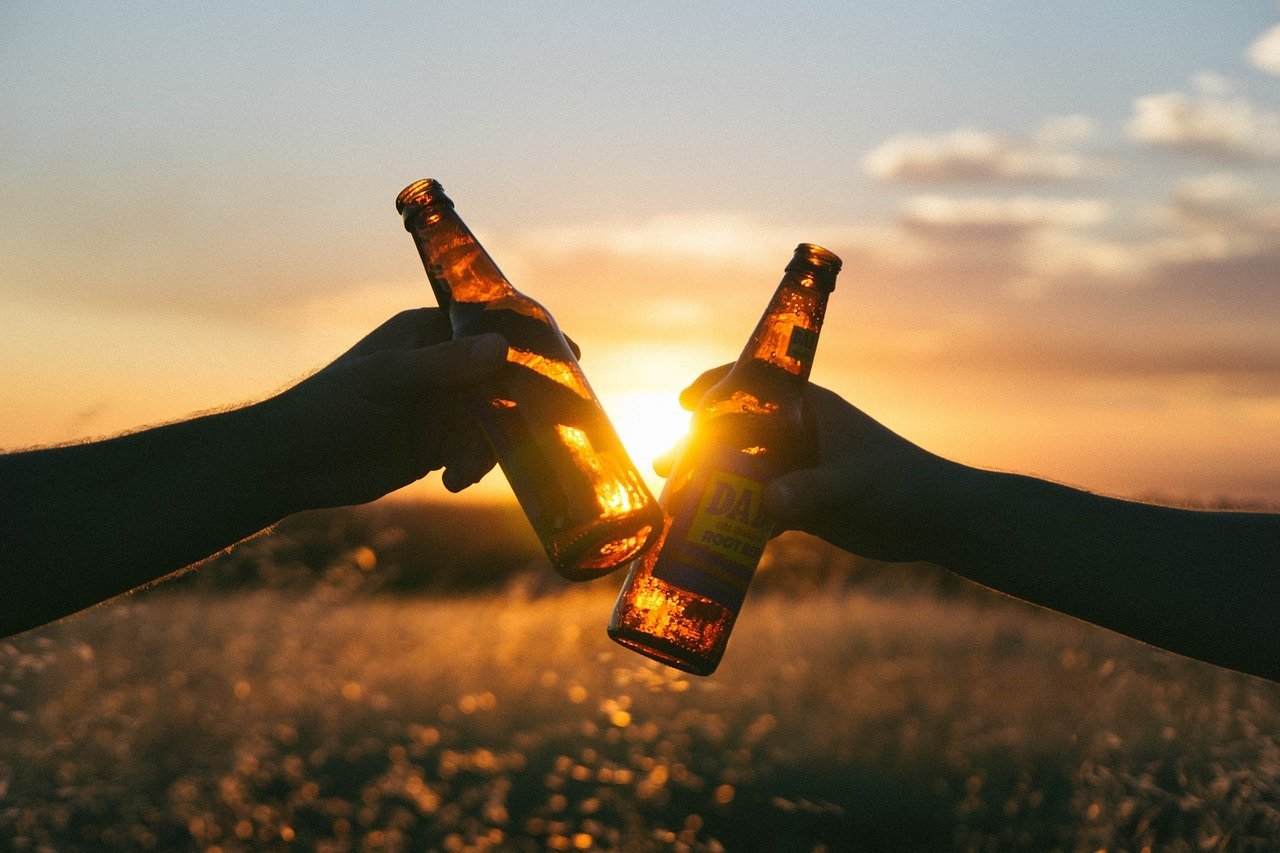 celebrate beers sunset congratulate clients on a new job